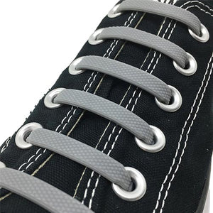 Grey E3 Silicone laces in black sneaker, no tie lace
